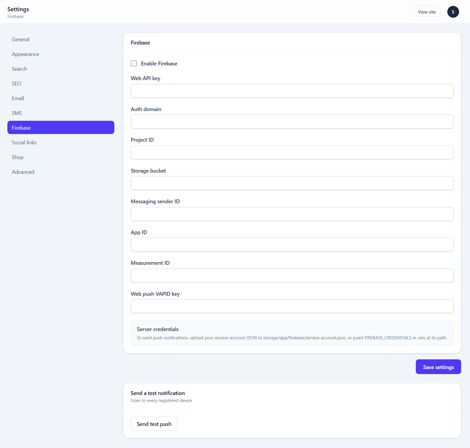 The Firebase settings screen with the web app config fields and the service-account credentials notice