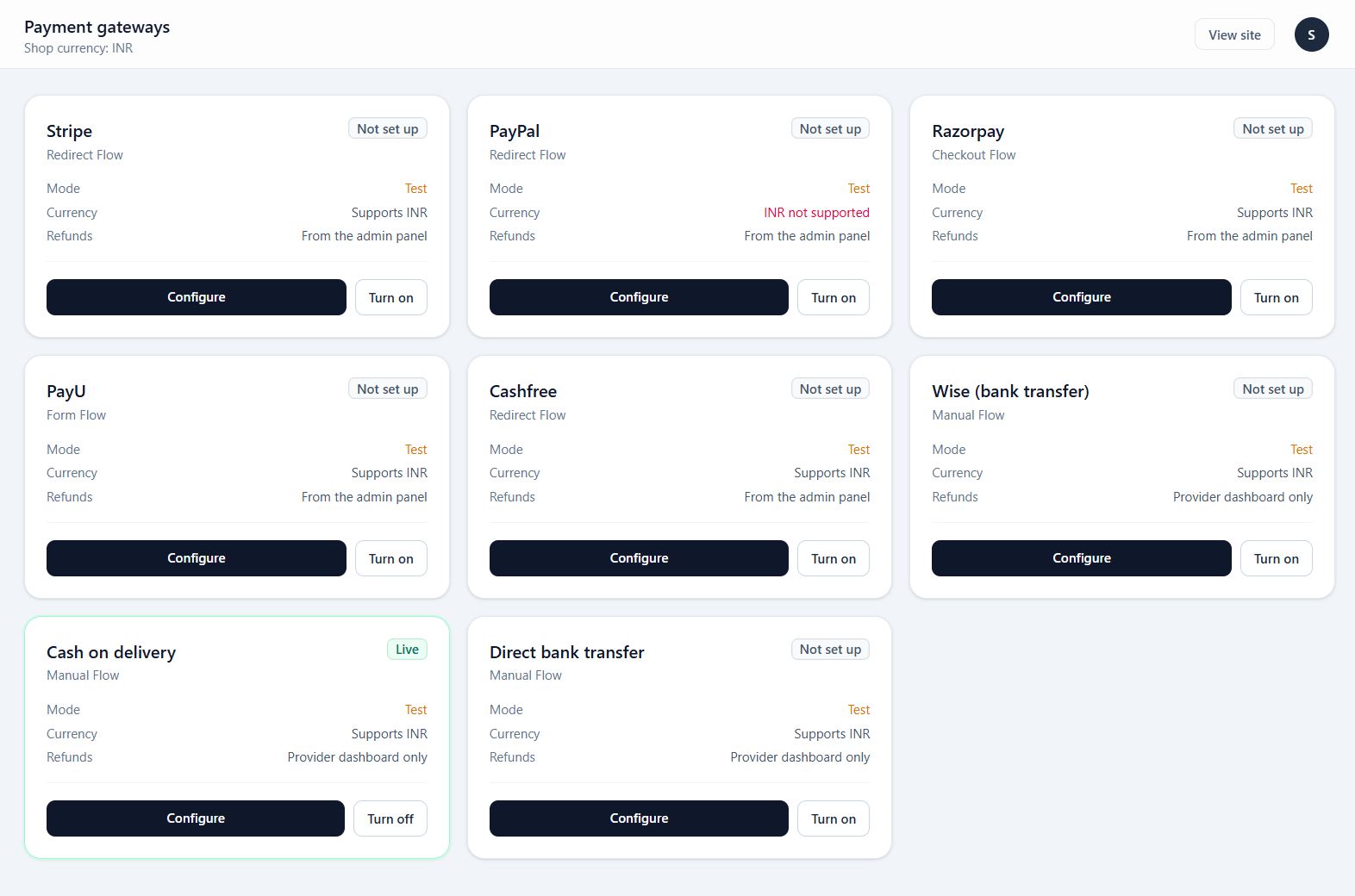 The payment gateway list, each row showing the gateway, its enabled state and whether credentials are complete