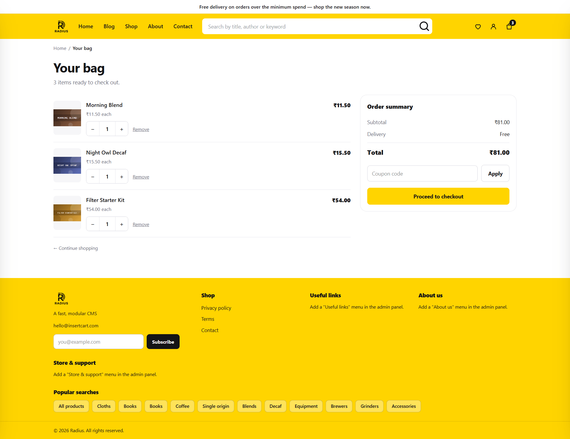 The cart page with line items, quantity controls, coupon field and totals